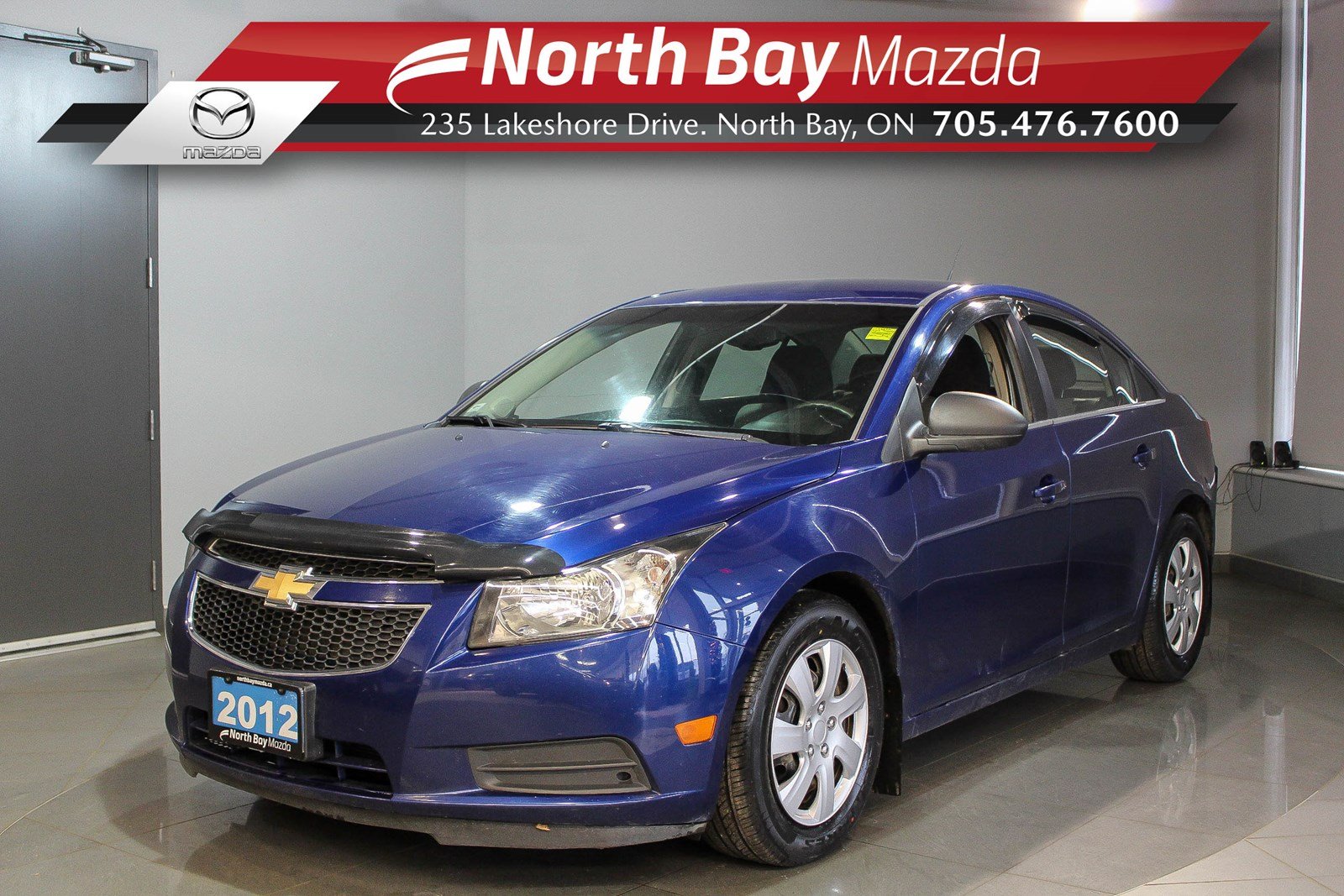 Pre Owned 2012 Chevrolet Cruze Ls Auto Transmission With Auto Headlights Cloth Interior Fwd 4dr Car